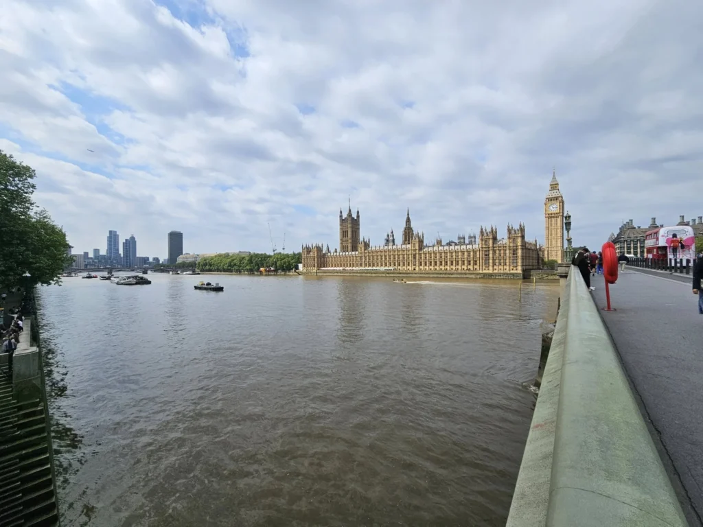 Cruising with Danny and Peter, Holland America Line, Nieuw Statendam, Dover, London, England, United Kingdom, Adventure | A vibrant collage of our Holland America Line Nieuw Statendam cruise adventure, featuring the majestic White Cliffs of Dover glowing under a sunset as the ship sails away, the iconic London Eye offering panoramic Thames views, Big Ben’s Gothic clock tower rising above the Palace of Westminster, Westminster Abbey’s intricate arches, Buckingham Palace’s gilded gates with Grenadier Guards, Tower Bridge’s Victorian towers spanning the river, St. Paul’s Cathedral’s grand dome, Leadenhall Market’s bustling Harry Potter-inspired alleys, the Nieuw Statendam docked at Dover’s historic port, and a classic black London cab navigating Trafalgar Square’s lively streets, all under a dynamic urban sky.