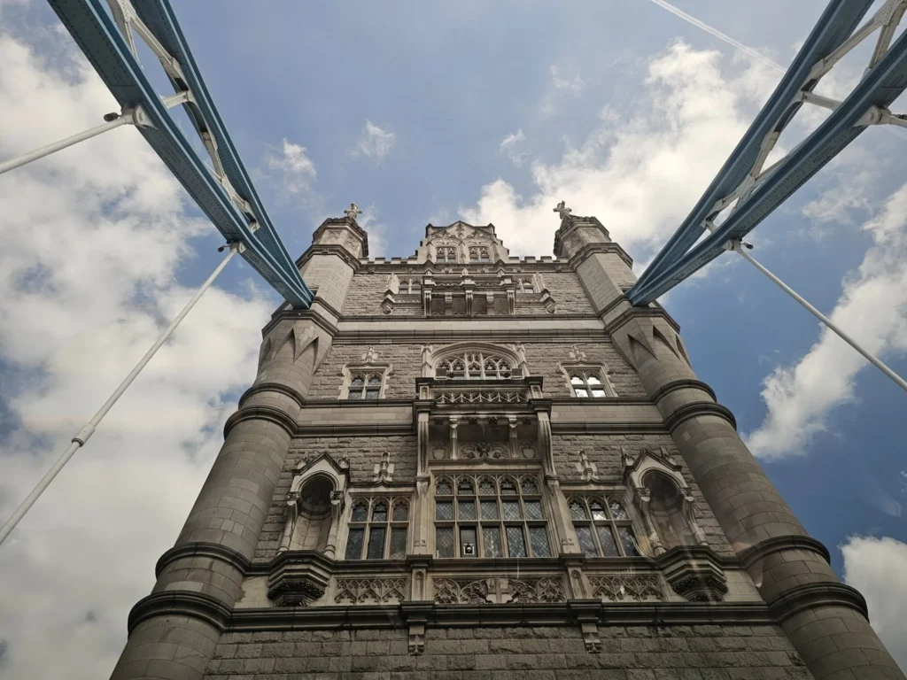 Cruising with Danny and Peter, Holland America Line, Nieuw Statendam, Dover, London, England, United Kingdom, Adventure | A vibrant collage of our Holland America Line Nieuw Statendam cruise adventure, featuring the majestic White Cliffs of Dover glowing under a sunset as the ship sails away, the iconic London Eye offering panoramic Thames views, Big Ben’s Gothic clock tower rising above the Palace of Westminster, Westminster Abbey’s intricate arches, Buckingham Palace’s gilded gates with Grenadier Guards, Tower Bridge’s Victorian towers spanning the river, St. Paul’s Cathedral’s grand dome, Leadenhall Market’s bustling Harry Potter-inspired alleys, the Nieuw Statendam docked at Dover’s historic port, and a classic black London cab navigating Trafalgar Square’s lively streets, all under a dynamic urban sky.