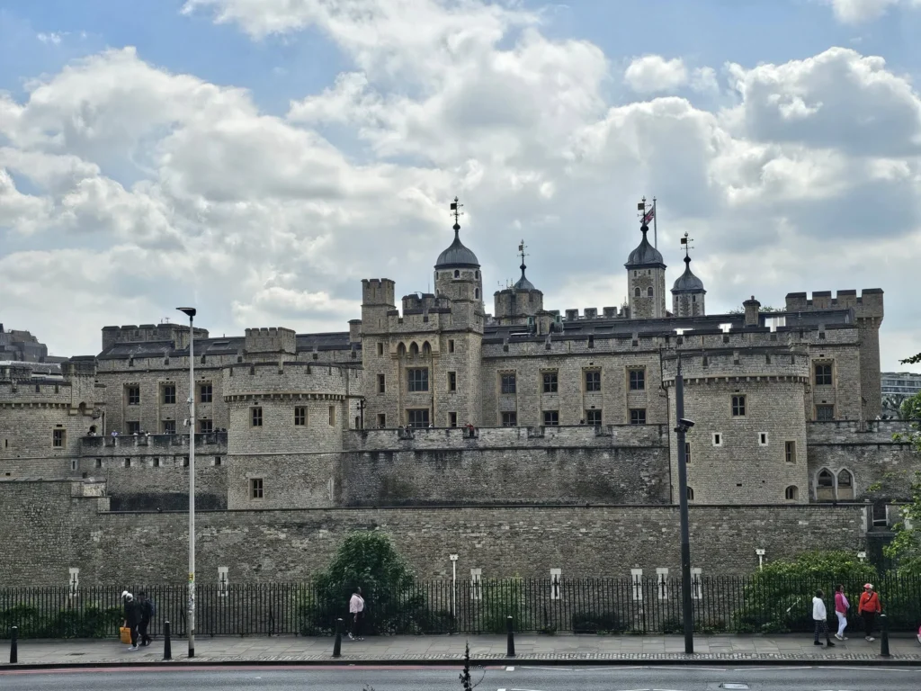 Cruising with Danny and Peter, Holland America Line, Nieuw Statendam, Dover, London, England, United Kingdom, Adventure | A vibrant collage of our Holland America Line Nieuw Statendam cruise adventure, featuring the majestic White Cliffs of Dover glowing under a sunset as the ship sails away, the iconic London Eye offering panoramic Thames views, Big Ben’s Gothic clock tower rising above the Palace of Westminster, Westminster Abbey’s intricate arches, Buckingham Palace’s gilded gates with Grenadier Guards, Tower Bridge’s Victorian towers spanning the river, St. Paul’s Cathedral’s grand dome, Leadenhall Market’s bustling Harry Potter-inspired alleys, the Nieuw Statendam docked at Dover’s historic port, and a classic black London cab navigating Trafalgar Square’s lively streets, all under a dynamic urban sky.