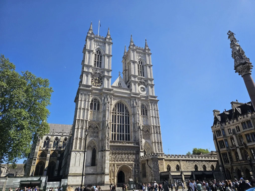 Cruising with Danny and Peter, Holland America Line, Nieuw Statendam, Dover, London, England, United Kingdom, Adventure | A vibrant collage of our Holland America Line Nieuw Statendam cruise adventure, featuring the majestic White Cliffs of Dover glowing under a sunset as the ship sails away, the iconic London Eye offering panoramic Thames views, Big Ben’s Gothic clock tower rising above the Palace of Westminster, Westminster Abbey’s intricate arches, Buckingham Palace’s gilded gates with Grenadier Guards, Tower Bridge’s Victorian towers spanning the river, St. Paul’s Cathedral’s grand dome, Leadenhall Market’s bustling Harry Potter-inspired alleys, the Nieuw Statendam docked at Dover’s historic port, and a classic black London cab navigating Trafalgar Square’s lively streets, all under a dynamic urban sky.