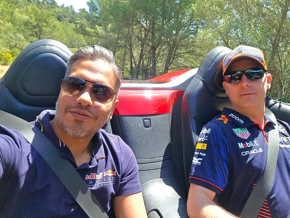 Cruising with Danny and Peter, Holland America Line, Nieuw Statendam, Palma de Mallorca, Spain | Scenic coastal drive in Mallorca during the Palma de Mallorca Sunset Tour, featuring rugged cliffs and azure waters. Historic Palma Cathedral with Gothic architecture is also highlighted. The luxurious seafood feast aboard MS Nieuw Statendam includes lobster, shrimp, and crab, complemented by a stunning Mediterranean sunset with pink and gold hues in the sky.