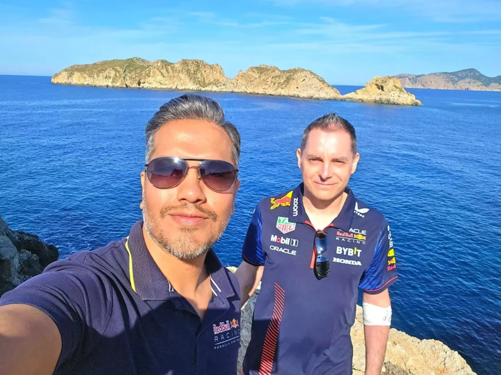 Cruising with Danny and Peter, Holland America Line, Nieuw Statendam, Palma de Mallorca, Spain | Scenic coastal drive in Mallorca during the Palma de Mallorca Sunset Tour, featuring rugged cliffs and azure waters. Historic Palma Cathedral with Gothic architecture is also highlighted. The luxurious seafood feast aboard MS Nieuw Statendam includes lobster, shrimp, and crab, complemented by a stunning Mediterranean sunset with pink and gold hues in the sky.