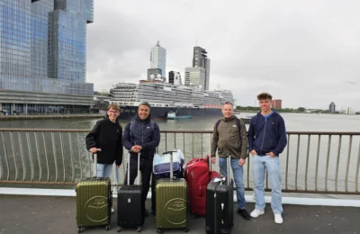 Cruising with Danny and Peter, Holland America Line, Nieuw Statendam, Rotterdam, The Netherlands, Canary Islands Adventure | A vibrant collage captures a family’s adventure on Holland America’s Nieuw Statendam during the Canary Island Enchantment cruise. The journey begins in Rotterdam, Netherlands, with the sleek ship docked against the city’s modern skyline, featuring the Erasmus Bridge. Onboard, the elegant atrium glows with Dutch-inspired decor, while the cozy Oceanview Family Cabin offers serene ocean views. The Lido Pool sparkles under the sun, and the Crow’s Nest provides panoramic vistas. In Agadir, Morocco, vibrant Souk El Had stalls overflow with colorful spices and crafts, and camel rides evoke Berber traditions. Lanzarote’s Cueva de los Verdes showcases dramatic lava tube formations, while Jameos del Agua features a surreal volcanic cave with a turquoise lake. Tenerife’s Anaga Rural Park displays misty laurel forests, and Playa de las Teresitas glows with golden sands. In Funchal, Madeira, a trike tour winds through banana fields, with Cabo Girão’s glass skywalk offering stunning cliff views. Porto’s rainy Ribeira District shines with colorful buildings and azulejo tiles at São Bento Station. In London, a black cab tour passes the iconic Tower Bridge and Buckingham Palace. The cruise ends with a serene sail-away past Dover’s White Cliffs, followed by a heartfelt family reunion in Rotterdam’s Zalmhaventoren apartment, with the city’s skyline in the background.