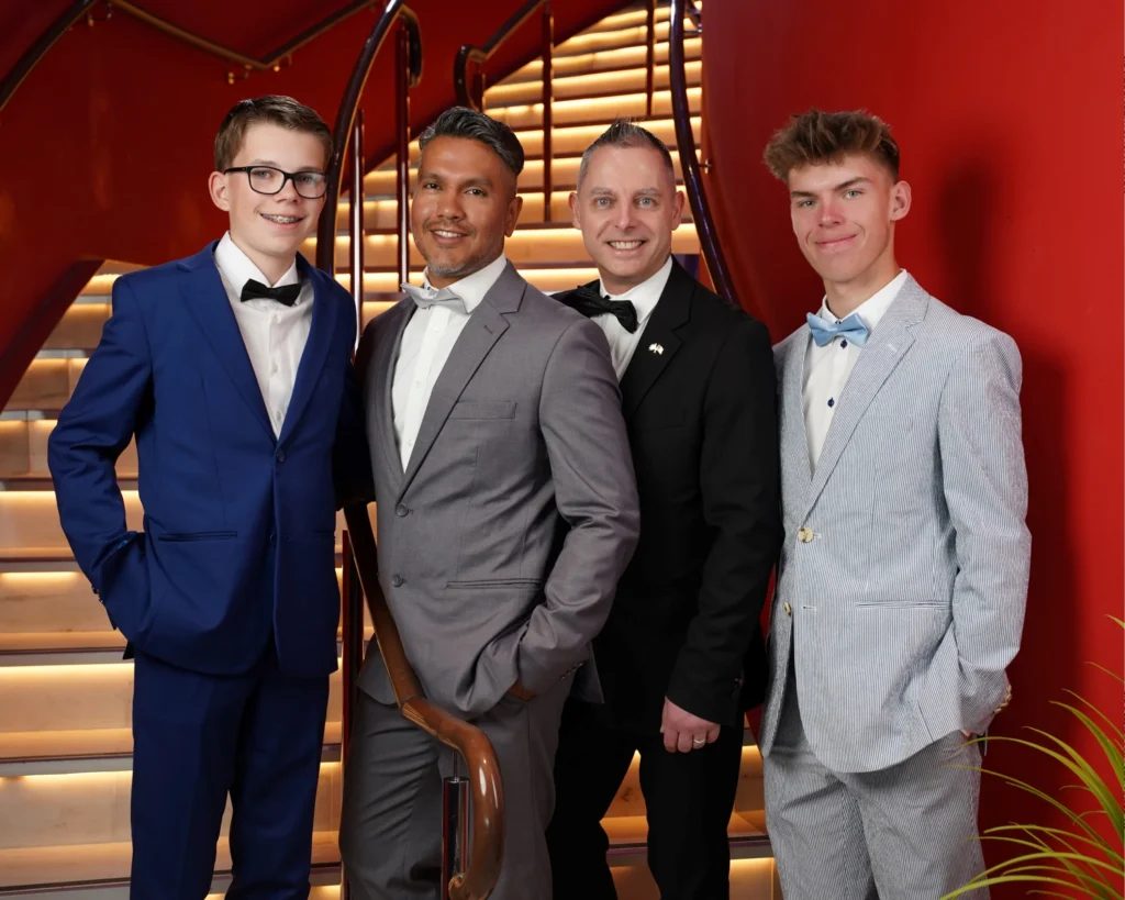 Cruising with Danny and Peter, Holland America Line, Nieuw Statendam, Rotterdam, The Netherlands, Canary Islands Adventure | A vibrant collage captures a family’s adventure on Holland America’s Nieuw Statendam during the Canary Island Enchantment cruise. The journey begins in Rotterdam, Netherlands, with the sleek ship docked against the city’s modern skyline, featuring the Erasmus Bridge. Onboard, the elegant atrium glows with Dutch-inspired decor, while the cozy Oceanview Family Cabin offers serene ocean views. The Lido Pool sparkles under the sun, and the Crow’s Nest provides panoramic vistas. In Agadir, Morocco, vibrant Souk El Had stalls overflow with colorful spices and crafts, and camel rides evoke Berber traditions. Lanzarote’s Cueva de los Verdes showcases dramatic lava tube formations, while Jameos del Agua features a surreal volcanic cave with a turquoise lake. Tenerife’s Anaga Rural Park displays misty laurel forests, and Playa de las Teresitas glows with golden sands. In Funchal, Madeira, a trike tour winds through banana fields, with Cabo Girão’s glass skywalk offering stunning cliff views. Porto’s rainy Ribeira District shines with colorful buildings and azulejo tiles at São Bento Station. In London, a black cab tour passes the iconic Tower Bridge and Buckingham Palace. The cruise ends with a serene sail-away past Dover’s White Cliffs, followed by a heartfelt family reunion in Rotterdam’s Zalmhaventoren apartment, with the city’s skyline in the background.