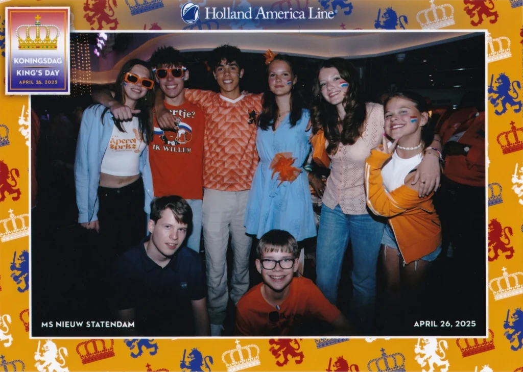 Cruising with Danny and Peter, Holland America Line, Nieuw Statendam, Rotterdam, The Netherlands, Canary Islands Adventure | A vibrant collage captures a family’s adventure on Holland America’s Nieuw Statendam during the Canary Island Enchantment cruise. The journey begins in Rotterdam, Netherlands, with the sleek ship docked against the city’s modern skyline, featuring the Erasmus Bridge. Onboard, the elegant atrium glows with Dutch-inspired decor, while the cozy Oceanview Family Cabin offers serene ocean views. The Lido Pool sparkles under the sun, and the Crow’s Nest provides panoramic vistas. In Agadir, Morocco, vibrant Souk El Had stalls overflow with colorful spices and crafts, and camel rides evoke Berber traditions. Lanzarote’s Cueva de los Verdes showcases dramatic lava tube formations, while Jameos del Agua features a surreal volcanic cave with a turquoise lake. Tenerife’s Anaga Rural Park displays misty laurel forests, and Playa de las Teresitas glows with golden sands. In Funchal, Madeira, a trike tour winds through banana fields, with Cabo Girão’s glass skywalk offering stunning cliff views. Porto’s rainy Ribeira District shines with colorful buildings and azulejo tiles at São Bento Station. In London, a black cab tour passes the iconic Tower Bridge and Buckingham Palace. The cruise ends with a serene sail-away past Dover’s White Cliffs, followed by a heartfelt family reunion in Rotterdam’s Zalmhaventoren apartment, with the city’s skyline in the background.