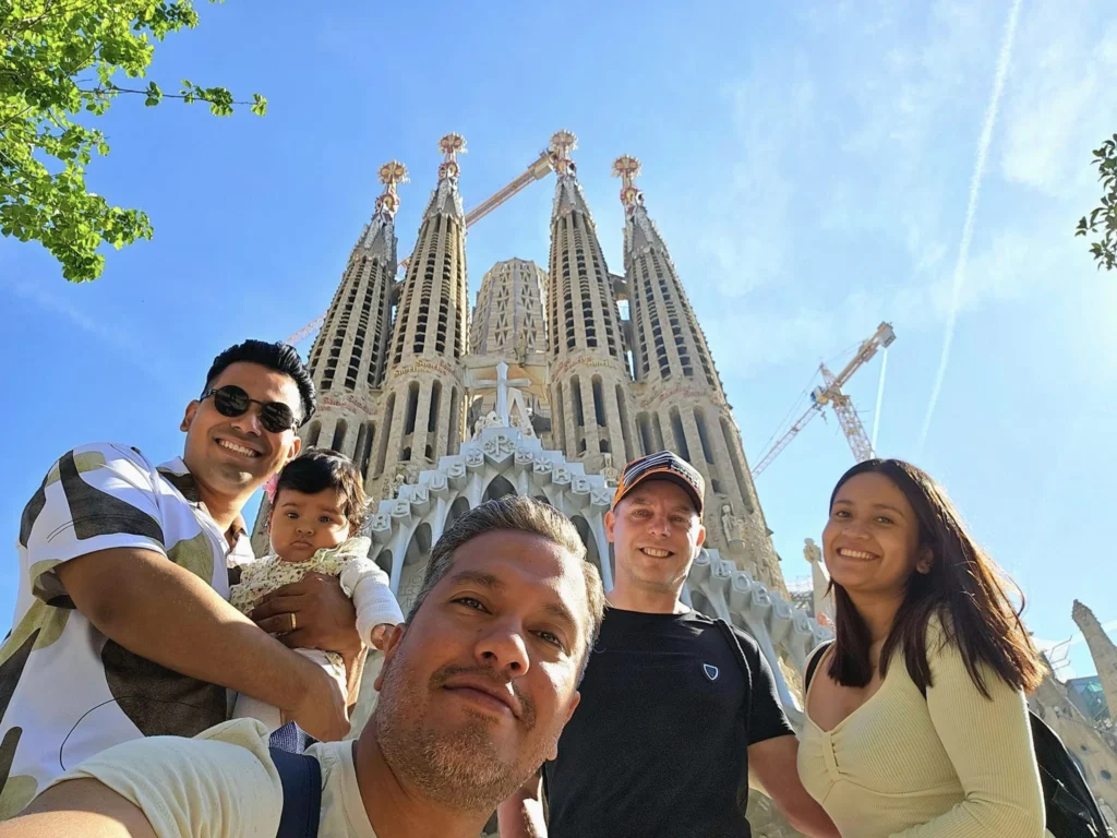 Cruising with Danny and Peter, Holland America Line, Nieuw Statendam, Barcelona, Spain | Family reunion at Barcelona port with loved ones, exploring the Sagrada Familia's stunning facade, enjoying a relaxing Sitges beach day, and dining together on the MS Nieuw Statendam during a memorable Mediterranean family adventure.