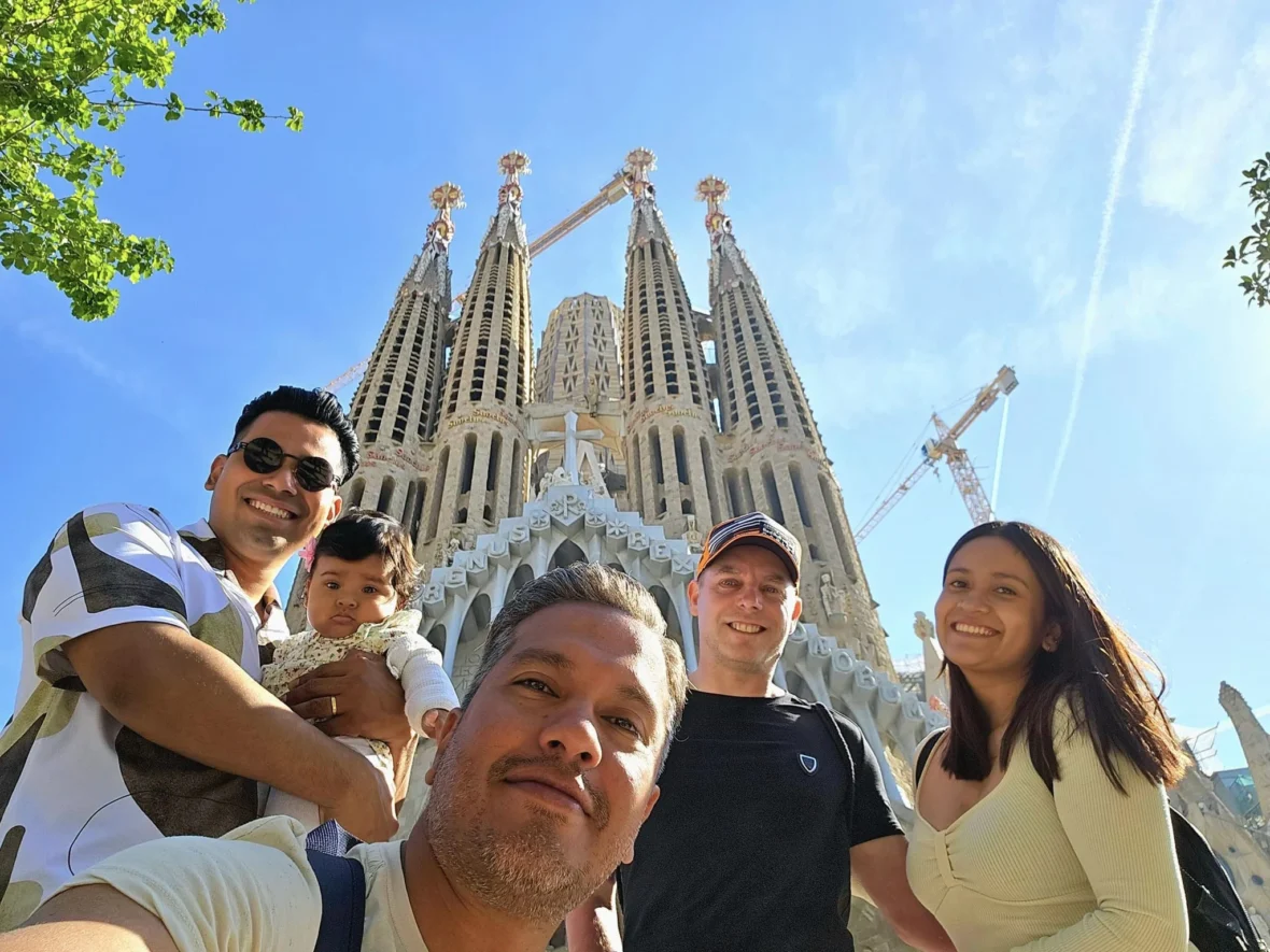 Cruising with Danny and Peter, Holland America Line, Nieuw Statendam, Barcelona, Spain | Family reunion at Barcelona port with loved ones, exploring the Sagrada Familia's stunning facade, enjoying a relaxing Sitges beach day, and dining together on the MS Nieuw Statendam during a memorable Mediterranean family adventure.