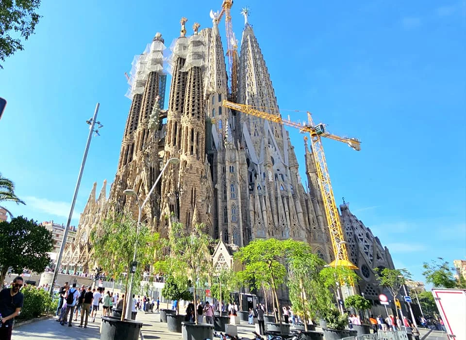 Cruising with Danny and Peter, Holland America Line, Nieuw Statendam, Barcelona, Spain | Family reunion at Barcelona port with loved ones, exploring the Sagrada Familia's stunning facade, enjoying a relaxing Sitges beach day, and dining together on the MS Nieuw Statendam during a memorable Mediterranean family adventure.