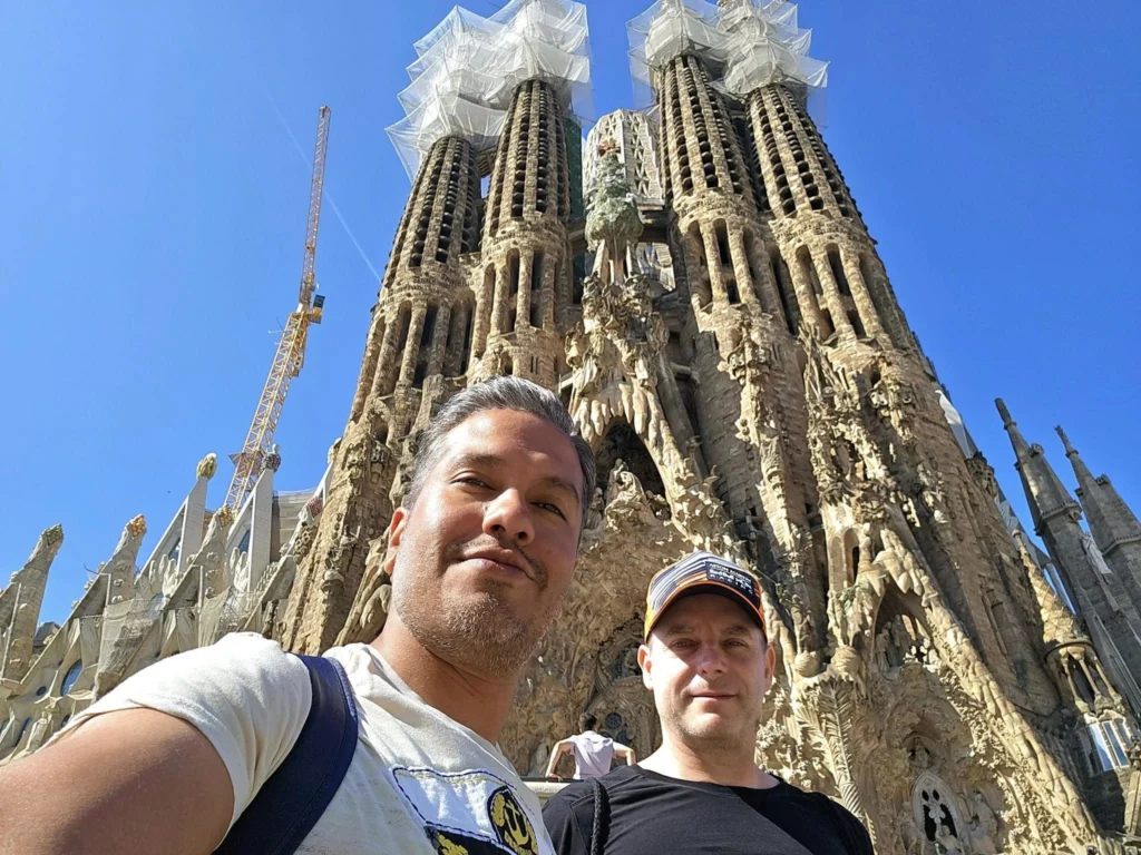 Cruising with Danny and Peter, Holland America Line, Nieuw Statendam, Barcelona, Spain | Family reunion at Barcelona port with loved ones, exploring the Sagrada Familia's stunning facade, enjoying a relaxing Sitges beach day, and dining together on the MS Nieuw Statendam during a memorable Mediterranean family adventure.