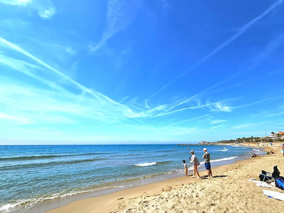 Cruising with Danny and Peter, Holland America Line, Nieuw Statendam, Barcelona, Spain | Family reunion at Barcelona port with loved ones, exploring the Sagrada Familia's stunning facade, enjoying a relaxing Sitges beach day, and dining together on the MS Nieuw Statendam during a memorable Mediterranean family adventure.