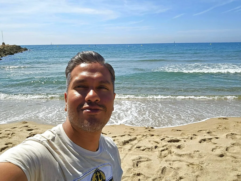 Cruising with Danny and Peter, Holland America Line, Nieuw Statendam, Barcelona, Spain | Family reunion at Barcelona port with loved ones, exploring the Sagrada Familia's stunning facade, enjoying a relaxing Sitges beach day, and dining together on the MS Nieuw Statendam during a memorable Mediterranean family adventure.