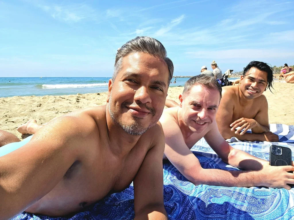 Cruising with Danny and Peter, Holland America Line, Nieuw Statendam, Barcelona, Spain | Family reunion at Barcelona port with loved ones, exploring the Sagrada Familia's stunning facade, enjoying a relaxing Sitges beach day, and dining together on the MS Nieuw Statendam during a memorable Mediterranean family adventure.