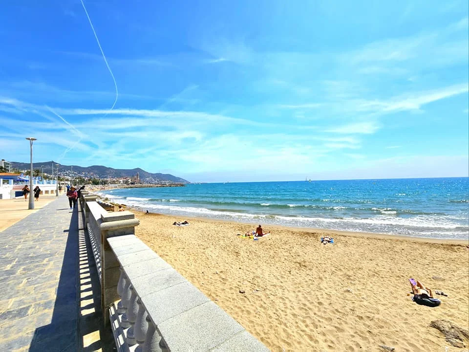 Cruising with Danny and Peter, Holland America Line, Nieuw Statendam, Barcelona, Spain | Family reunion at Barcelona port with loved ones, exploring the Sagrada Familia's stunning facade, enjoying a relaxing Sitges beach day, and dining together on the MS Nieuw Statendam during a memorable Mediterranean family adventure.