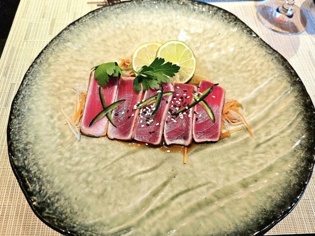 Cruising with Danny and Peter, Holland America Line, Nieuw Statendam, Barcelona, Spain | Family reunion at Barcelona port with loved ones, exploring the Sagrada Familia's stunning facade, enjoying a relaxing Sitges beach day, and dining together on the MS Nieuw Statendam during a memorable Mediterranean family adventure.