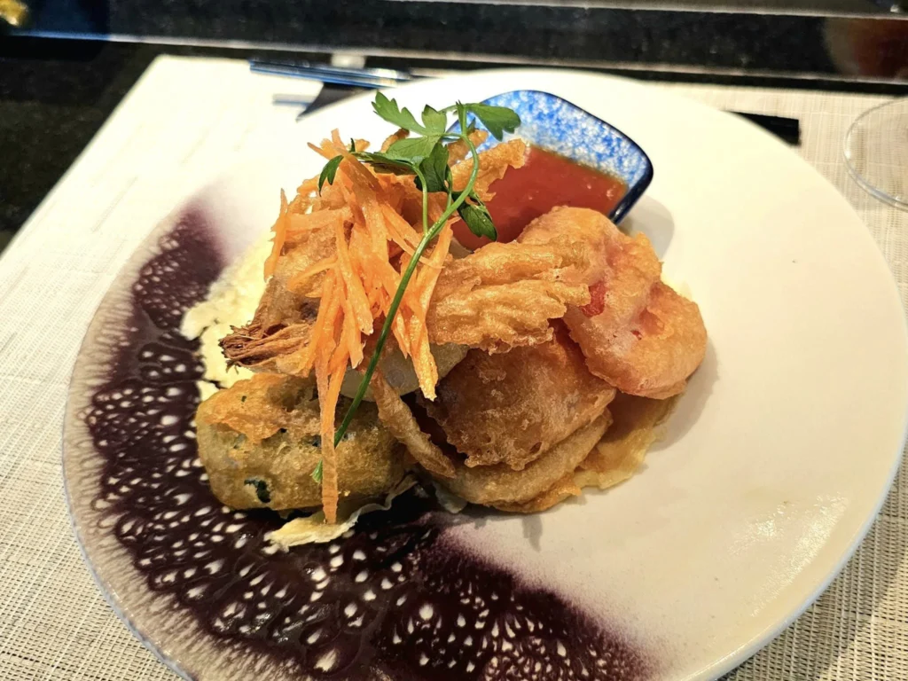 Cruising with Danny and Peter, Holland America Line, Nieuw Statendam, Barcelona, Spain | Family reunion at Barcelona port with loved ones, exploring the Sagrada Familia's stunning facade, enjoying a relaxing Sitges beach day, and dining together on the MS Nieuw Statendam during a memorable Mediterranean family adventure.