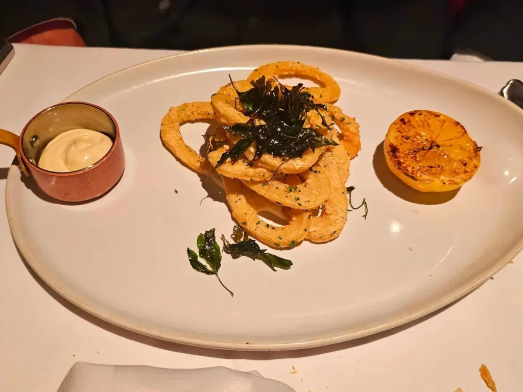 Cruising with Danny and Peter, Holland America Line, Nieuw Statendam, Cartagena, Spain | Experience unforgettable Cartagena Spain cruise adventures with Holland America, featuring an exciting trike tour through historic streets, a leisurely bike ride along the scenic Mediterranean waterfront, and luxurious dining at Sel de Mer Restaurant, showcasing exquisite seafood dishes and an elegant evening gala dinner.