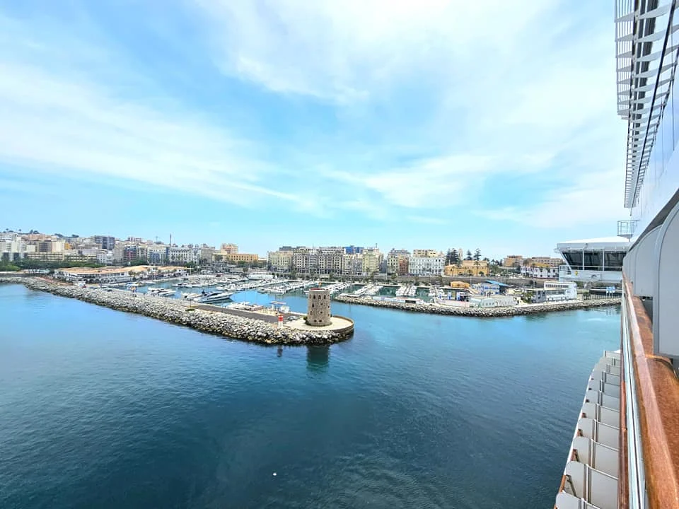 Cruising with Danny and Peter, Holland America Line, Nieuw Statendam, Ceuta, Spanish Morocco, Spain | Travelers on a Ceuta Heritage Tour with Holland America Line explore the historic Royal Walls and enjoy breathtaking panoramic views, while savoring North African dishes at Cafeteria Rotterdam during their Mediterranean culinary journey.