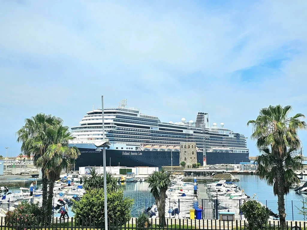 Cruising with Danny and Peter, Holland America Line, Nieuw Statendam, Ceuta, Spanish Morocco, Spain | Travelers on a Ceuta Heritage Tour with Holland America Line explore the historic Royal Walls and enjoy breathtaking panoramic views, while savoring North African dishes at Cafeteria Rotterdam during their Mediterranean culinary journey.