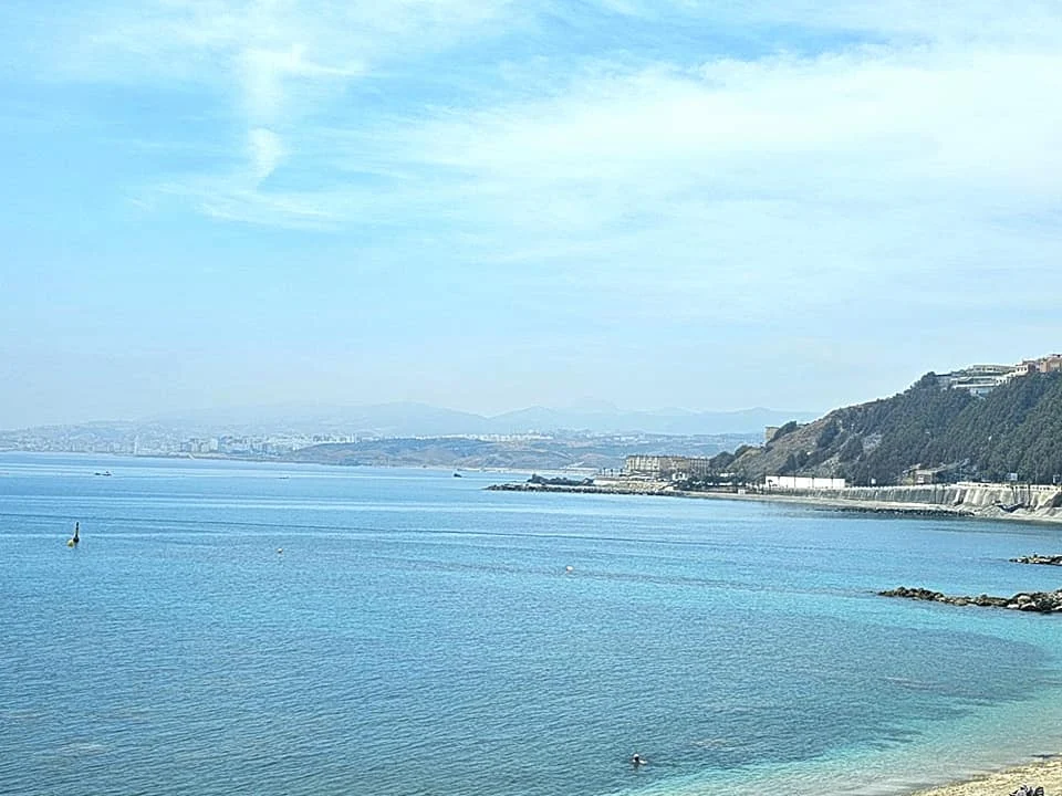 Cruising with Danny and Peter, Holland America Line, Nieuw Statendam, Ceuta, Spanish Morocco, Spain | Travelers on a Ceuta Heritage Tour with Holland America Line explore the historic Royal Walls and enjoy breathtaking panoramic views, while savoring North African dishes at Cafeteria Rotterdam during their Mediterranean culinary journey.