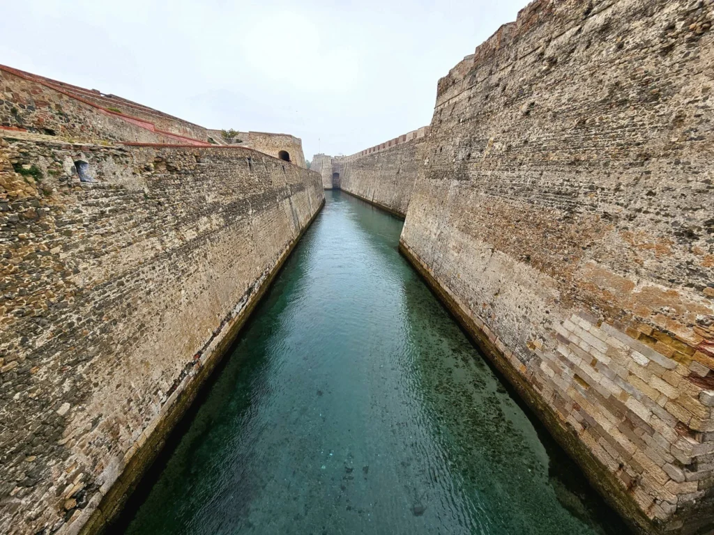 Cruising with Danny and Peter, Holland America Line, Nieuw Statendam, Ceuta, Spanish Morocco, Spain | Travelers on a Ceuta Heritage Tour with Holland America Line explore the historic Royal Walls and enjoy breathtaking panoramic views, while savoring North African dishes at Cafeteria Rotterdam during their Mediterranean culinary journey.
