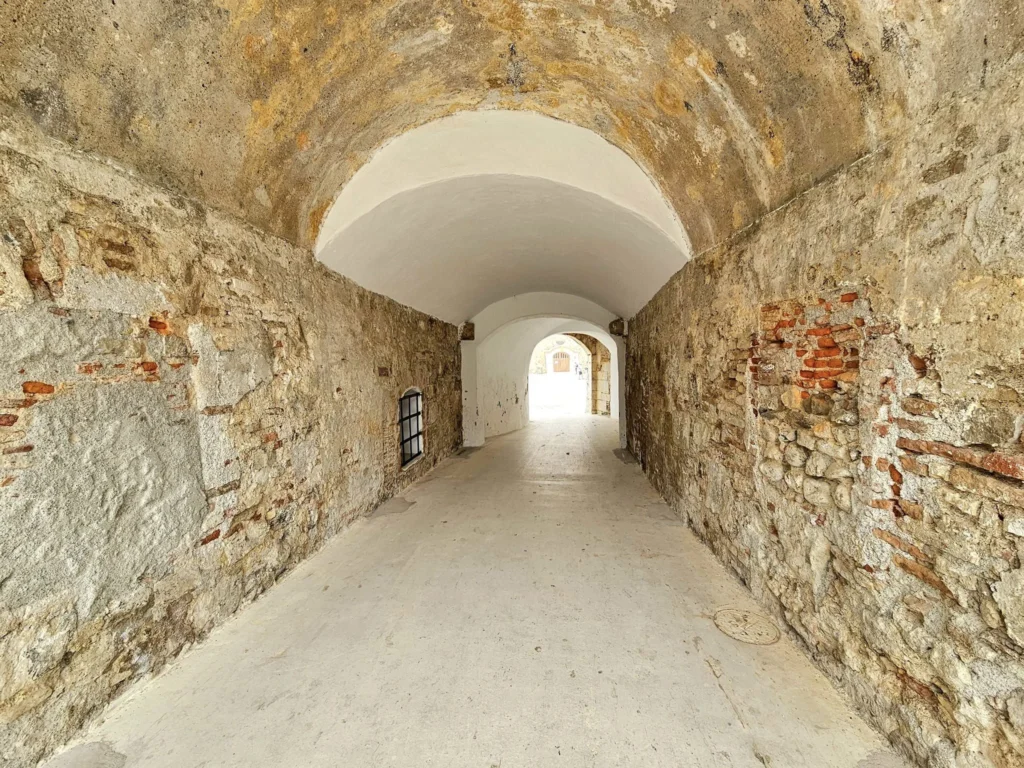 Cruising with Danny and Peter, Holland America Line, Nieuw Statendam, Ceuta, Spanish Morocco, Spain | Travelers on a Ceuta Heritage Tour with Holland America Line explore the historic Royal Walls and enjoy breathtaking panoramic views, while savoring North African dishes at Cafeteria Rotterdam during their Mediterranean culinary journey.