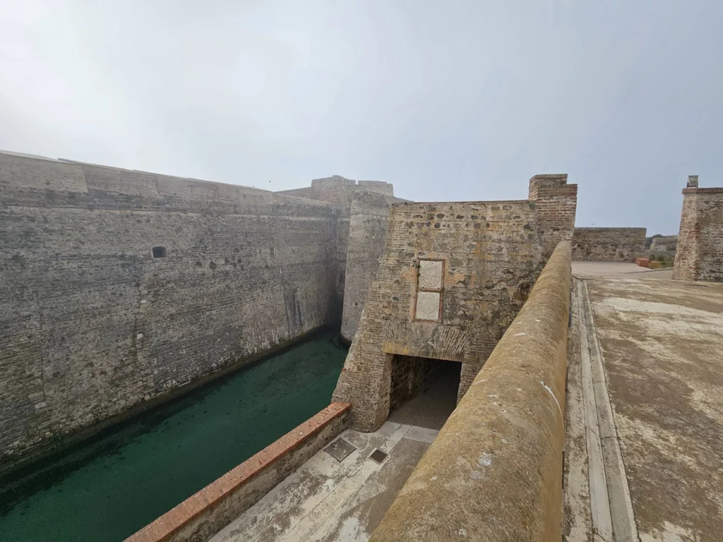 Cruising with Danny and Peter, Holland America Line, Nieuw Statendam, Ceuta, Spanish Morocco, Spain | Travelers on a Ceuta Heritage Tour with Holland America Line explore the historic Royal Walls and enjoy breathtaking panoramic views, while savoring North African dishes at Cafeteria Rotterdam during their Mediterranean culinary journey.