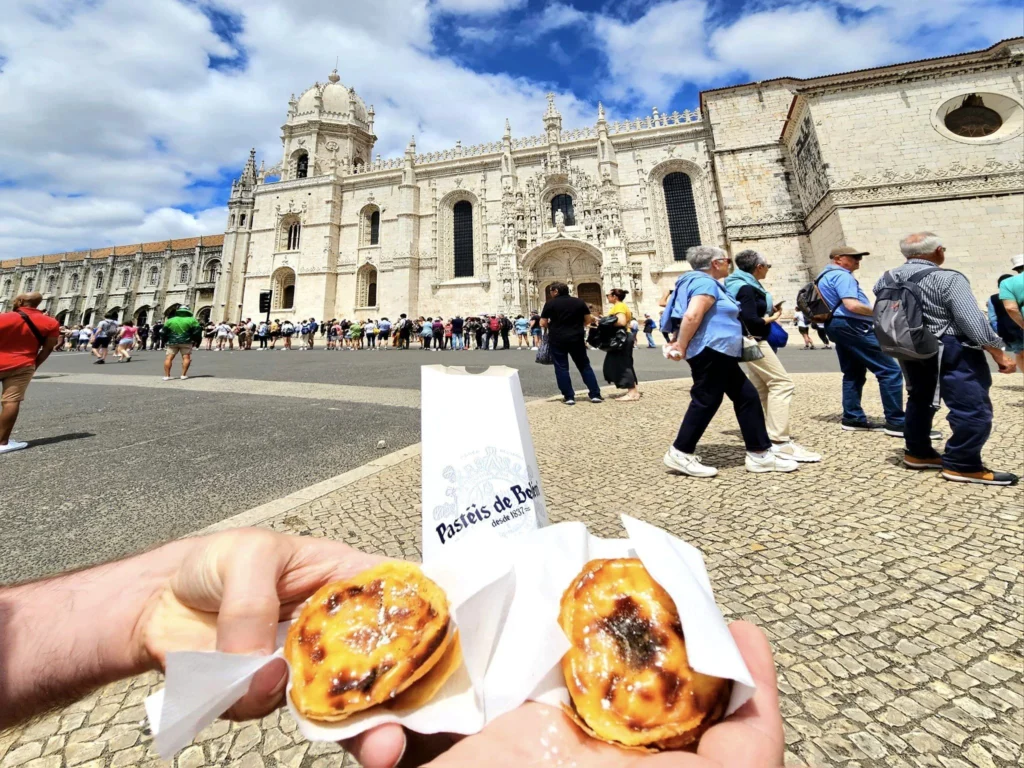 Cruising with Danny and Peter, Holland America Line, Nieuw Statendam, Lisbon, Portugal | Explore Belem Lisbon with Holland America Line: see the historic Belém Tower, the intricate Jerónimos Monastery, and savor Portuguese custard tarts from Pastéis de Belém, all while aboard the luxurious MS Nieuw Statendam.