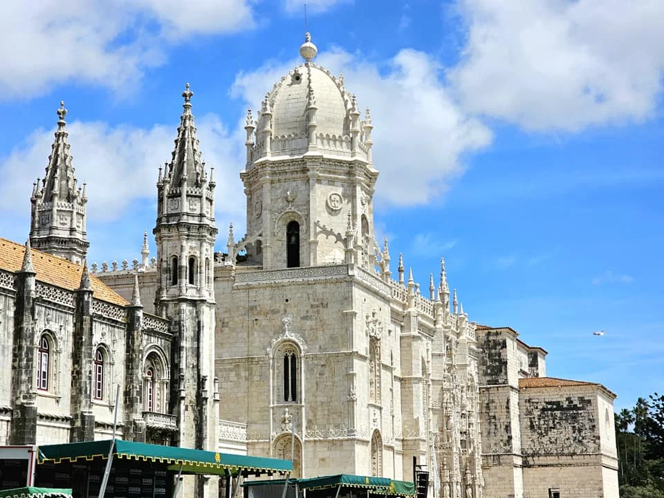 Cruising with Danny and Peter, Holland America Line, Nieuw Statendam, Lisbon, Portugal | Explore Belem Lisbon with Holland America Line: see the historic Belém Tower, the intricate Jerónimos Monastery, and savor Portuguese custard tarts from Pastéis de Belém, all while aboard the luxurious MS Nieuw Statendam.