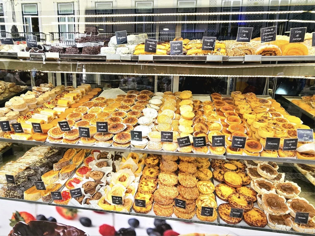 Cruising with Danny and Peter, Holland America Line, Nieuw Statendam, Lisbon, Portugal | Explore Belem Lisbon with Holland America Line: see the historic Belém Tower, the intricate Jerónimos Monastery, and savor Portuguese custard tarts from Pastéis de Belém, all while aboard the luxurious MS Nieuw Statendam.