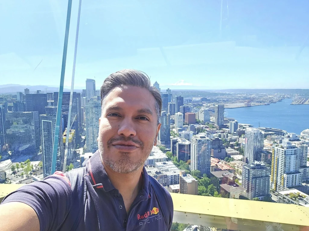 Cruising with Danny and Peter, Holland America Line, Westerdam, Seattle, Washington, United States, Day Trip Arctic Cruise | A vibrant collage capturing a day in Seattle, showcasing Lake Union’s serene waters reflecting the misty skyline with houseboats and kayakers, the towering Space Needle offering panoramic views of Puget Sound and Mount Rainier, and Chihuly Garden and Glass’s colorful glass sculptures blending with lush greenery. Pike Place Market buzzes with vendors tossing salmon and stalls brimming with flowers and artisanal goods under the iconic red sign. A cozy table at Villa Escondida displays tacos al pastor and enchiladas in a warm, mural-lined setting. The Seattle Great Wheel rises above Elliott Bay’s sparkling waterfront, while the Washington Park Arboretum’s tranquil paths feature blooming rhododendrons and a heron by a pond. The Japanese Garden’s koi pond, curved bridge, and stone lanterns create a Zen oasis, all set against Seattle’s dynamic blend of urban and natural beauty.