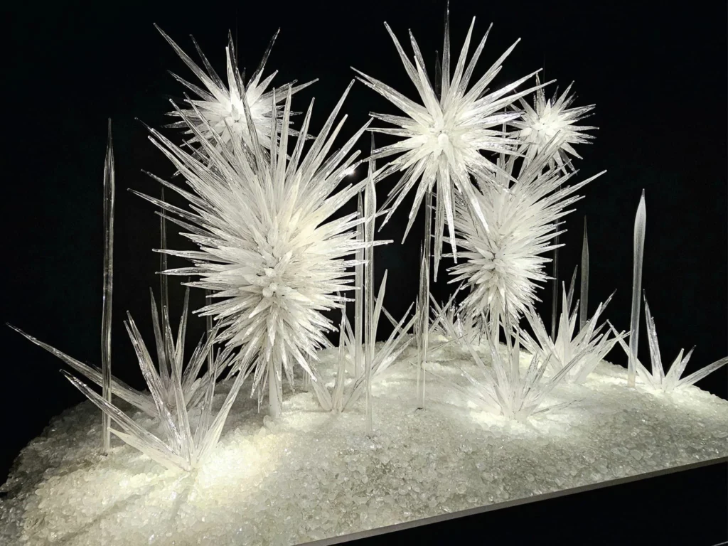 Cruising with Danny and Peter, Holland America Line, Westerdam, Seattle, Washington, United States, Day Trip Arctic Cruise | A vibrant collage capturing a day in Seattle, showcasing Lake Union’s serene waters reflecting the misty skyline with houseboats and kayakers, the towering Space Needle offering panoramic views of Puget Sound and Mount Rainier, and Chihuly Garden and Glass’s colorful glass sculptures blending with lush greenery. Pike Place Market buzzes with vendors tossing salmon and stalls brimming with flowers and artisanal goods under the iconic red sign. A cozy table at Villa Escondida displays tacos al pastor and enchiladas in a warm, mural-lined setting. The Seattle Great Wheel rises above Elliott Bay’s sparkling waterfront, while the Washington Park Arboretum’s tranquil paths feature blooming rhododendrons and a heron by a pond. The Japanese Garden’s koi pond, curved bridge, and stone lanterns create a Zen oasis, all set against Seattle’s dynamic blend of urban and natural beauty.