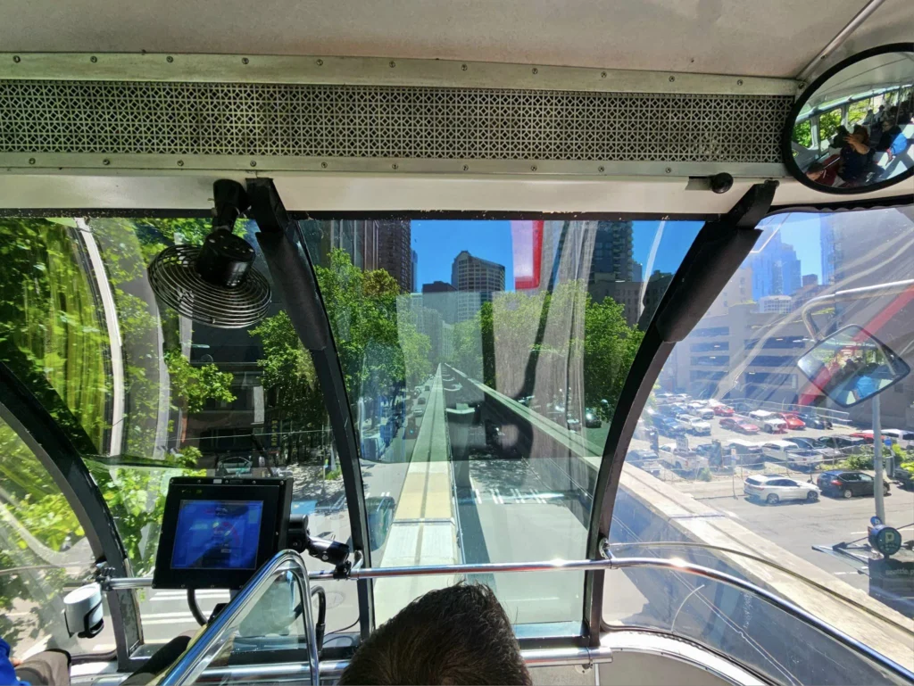 Cruising with Danny and Peter, Holland America Line, Westerdam, Seattle, Washington, United States, Day Trip Arctic Cruise | A vibrant collage capturing a day in Seattle, showcasing Lake Union’s serene waters reflecting the misty skyline with houseboats and kayakers, the towering Space Needle offering panoramic views of Puget Sound and Mount Rainier, and Chihuly Garden and Glass’s colorful glass sculptures blending with lush greenery. Pike Place Market buzzes with vendors tossing salmon and stalls brimming with flowers and artisanal goods under the iconic red sign. A cozy table at Villa Escondida displays tacos al pastor and enchiladas in a warm, mural-lined setting. The Seattle Great Wheel rises above Elliott Bay’s sparkling waterfront, while the Washington Park Arboretum’s tranquil paths feature blooming rhododendrons and a heron by a pond. The Japanese Garden’s koi pond, curved bridge, and stone lanterns create a Zen oasis, all set against Seattle’s dynamic blend of urban and natural beauty.