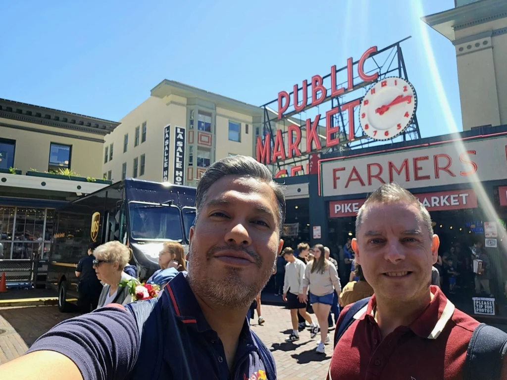Cruising with Danny and Peter, Holland America Line, Westerdam, Seattle, Washington, United States, Day Trip Arctic Cruise | A vibrant collage capturing a day in Seattle, showcasing Lake Union’s serene waters reflecting the misty skyline with houseboats and kayakers, the towering Space Needle offering panoramic views of Puget Sound and Mount Rainier, and Chihuly Garden and Glass’s colorful glass sculptures blending with lush greenery. Pike Place Market buzzes with vendors tossing salmon and stalls brimming with flowers and artisanal goods under the iconic red sign. A cozy table at Villa Escondida displays tacos al pastor and enchiladas in a warm, mural-lined setting. The Seattle Great Wheel rises above Elliott Bay’s sparkling waterfront, while the Washington Park Arboretum’s tranquil paths feature blooming rhododendrons and a heron by a pond. The Japanese Garden’s koi pond, curved bridge, and stone lanterns create a Zen oasis, all set against Seattle’s dynamic blend of urban and natural beauty.