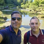 Cruising with Danny and Peter, Holland America Line, Westerdam, Seattle, Washington, United States, Day Trip Arctic Cruise | A vibrant collage capturing a day in Seattle, showcasing Lake Union’s serene waters reflecting the misty skyline with houseboats and kayakers, the towering Space Needle offering panoramic views of Puget Sound and Mount Rainier, and Chihuly Garden and Glass’s colorful glass sculptures blending with lush greenery. Pike Place Market buzzes with vendors tossing salmon and stalls brimming with flowers and artisanal goods under the iconic red sign. A cozy table at Villa Escondida displays tacos al pastor and enchiladas in a warm, mural-lined setting. The Seattle Great Wheel rises above Elliott Bay’s sparkling waterfront, while the Washington Park Arboretum’s tranquil paths feature blooming rhododendrons and a heron by a pond. The Japanese Garden’s koi pond, curved bridge, and stone lanterns create a Zen oasis, all set against Seattle’s dynamic blend of urban and natural beauty.