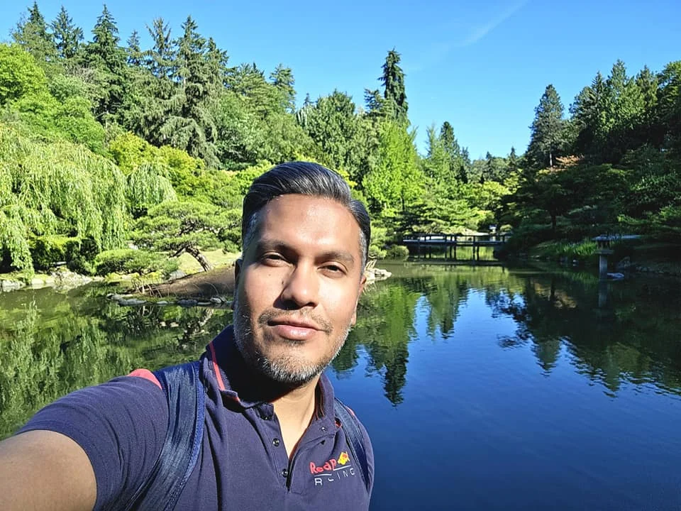 Cruising with Danny and Peter, Holland America Line, Westerdam, Seattle, Washington, United States, Day Trip Arctic Cruise | A vibrant collage capturing a day in Seattle, showcasing Lake Union’s serene waters reflecting the misty skyline with houseboats and kayakers, the towering Space Needle offering panoramic views of Puget Sound and Mount Rainier, and Chihuly Garden and Glass’s colorful glass sculptures blending with lush greenery. Pike Place Market buzzes with vendors tossing salmon and stalls brimming with flowers and artisanal goods under the iconic red sign. A cozy table at Villa Escondida displays tacos al pastor and enchiladas in a warm, mural-lined setting. The Seattle Great Wheel rises above Elliott Bay’s sparkling waterfront, while the Washington Park Arboretum’s tranquil paths feature blooming rhododendrons and a heron by a pond. The Japanese Garden’s koi pond, curved bridge, and stone lanterns create a Zen oasis, all set against Seattle’s dynamic blend of urban and natural beauty.