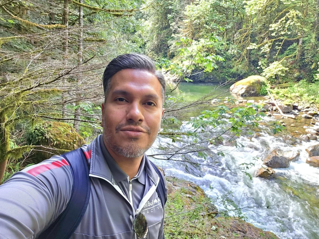 Cruising with Danny and Peter, Holland America Line, Westerdam, Seattle, Washington, United States, Day Trip Waterfalls History | A vibrant collage captures a day in Seattle’s Pacific Northwest Waterfalls Tour, showcasing Pike Place Market’s bustling scene with fishmongers tossing salmon and colorful flower stalls under the iconic red neon sign, set against Puget Sound’s waterfront; Twin Falls cascading over mossy cliffs into a misty pool, surrounded by old-growth evergreens in Olallie State Park, with sunlight filtering through the canopy; North Bend’s retro Twin Peaks diner with its glowing neon sign and quaint main street, framed by rolling hills and the Cascade Mountains; the majestic 270-foot Snoqualmie Falls roaring into a misty pool, with rainbows shimmering in the sunlight and a wooden viewing platform overlooking the lush Snoqualmie Valley; Snoqualmie’s historic district, featuring the Northwest Railway Museum’s vintage locomotives and charming shops lined with old-fashioned street lamps; Borst Lake’s serene waters reflecting Mount Si’s snow-capped peak, with a heron at the edge and evergreen forests under a soft morning mist; and the Museum of Flight’s sleek Concorde and Air Force One jets displayed in a spacious hangar, alongside interactive simulators and a replica of the International Space Station, showcasing Seattle’s aviation heritage.