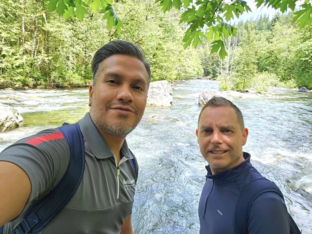 Cruising with Danny and Peter, Holland America Line, Westerdam, Seattle, Washington, United States, Day Trip Waterfalls History | A vibrant collage captures a day in Seattle’s Pacific Northwest Waterfalls Tour, showcasing Pike Place Market’s bustling scene with fishmongers tossing salmon and colorful flower stalls under the iconic red neon sign, set against Puget Sound’s waterfront; Twin Falls cascading over mossy cliffs into a misty pool, surrounded by old-growth evergreens in Olallie State Park, with sunlight filtering through the canopy; North Bend’s retro Twin Peaks diner with its glowing neon sign and quaint main street, framed by rolling hills and the Cascade Mountains; the majestic 270-foot Snoqualmie Falls roaring into a misty pool, with rainbows shimmering in the sunlight and a wooden viewing platform overlooking the lush Snoqualmie Valley; Snoqualmie’s historic district, featuring the Northwest Railway Museum’s vintage locomotives and charming shops lined with old-fashioned street lamps; Borst Lake’s serene waters reflecting Mount Si’s snow-capped peak, with a heron at the edge and evergreen forests under a soft morning mist; and the Museum of Flight’s sleek Concorde and Air Force One jets displayed in a spacious hangar, alongside interactive simulators and a replica of the International Space Station, showcasing Seattle’s aviation heritage.