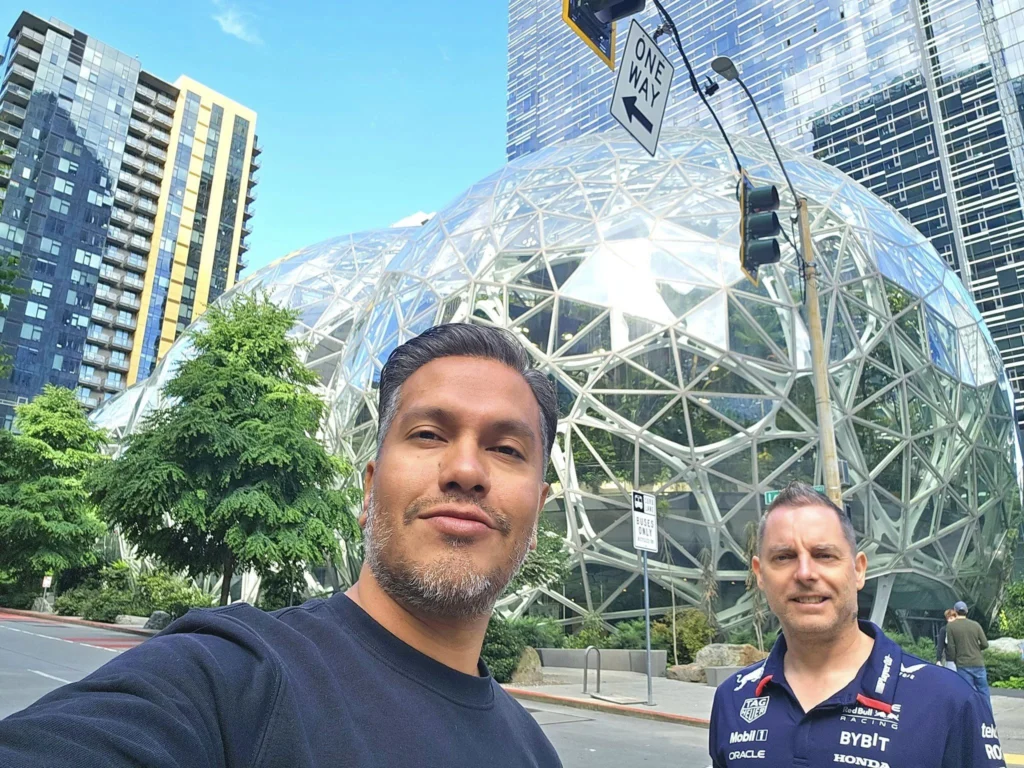 Cruising with Danny and Peter, Holland America Line, Westerdam, Seattle, Washington, United States, Alaska Solstice Cruise | A vibrant scene captures the Holland America Line’s Westerdam docked at Pier 91 in Seattle, Washington, with the iconic Space Needle and bustling Pike Place Market visible in the background, ready for the 28-Day Alaska Arctic Circle Solstice Cruise. The image showcases passengers excitedly boarding the ship, the luxurious stateroom with a spacious balcony offering stunning views of Elliott Bay, and the vessel setting sail from Seattle, marking the start of an unforgettable Alaskan adventure.