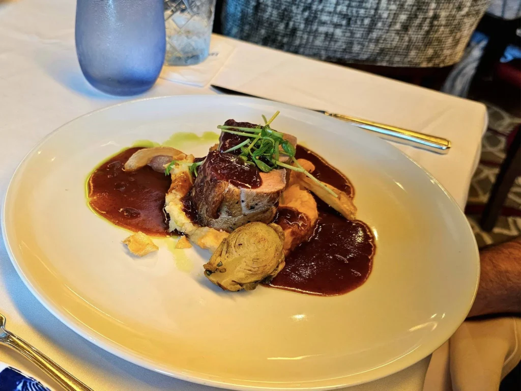 Cruising with Danny and Peter, Holland America Line, Westerdam, Seattle, Washington, United States, Alaska Solstice Cruise | A vibrant scene captures the Holland America Line’s Westerdam docked at Pier 91 in Seattle, Washington, with the iconic Space Needle and bustling Pike Place Market visible in the background, ready for the 28-Day Alaska Arctic Circle Solstice Cruise. The image showcases passengers excitedly boarding the ship, the luxurious stateroom with a spacious balcony offering stunning views of Elliott Bay, and the vessel setting sail from Seattle, marking the start of an unforgettable Alaskan adventure.