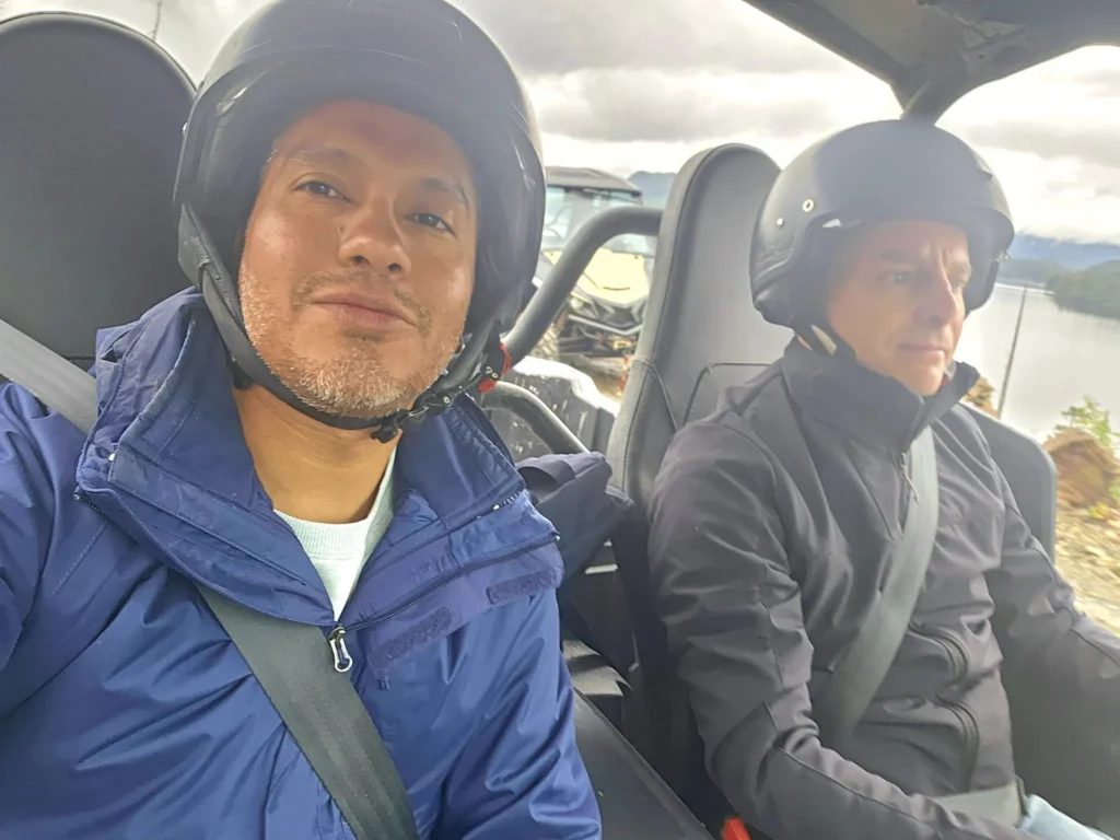 Cruising with Danny and Peter, Holland America Line, Westerdam, Ketchikan, Alaska, United States, Adventure History Thrills | A vibrant collage capturing the Ketchikan Adventure Tour in Alaska, featuring a dynamic log-rolling contest at the Great Alaskan Lumberjack Show with lumberjacks in plaid shirts balancing on a floating log, a rugged UTV navigating a muddy trail through the Tongass National Forest with George Inlet Fjords’ turquoise waters in view, a serene scenic cruise along the Inside Passage with a bald eagle soaring above mist-covered mountains, and a cozy scene at George Inlet Lodge with a rustic table set with craft beers, creamy crab chowder, hot Dungeness crab, and blueberry cheesecake. In the background, Ketchikan’s historic Creek Street showcases colorful buildings on stilts and a Tlingit totem pole, framed by lush greenery and rugged Alaskan peaks, embodying the city’s thrilling adventures and rich cultural heritage.