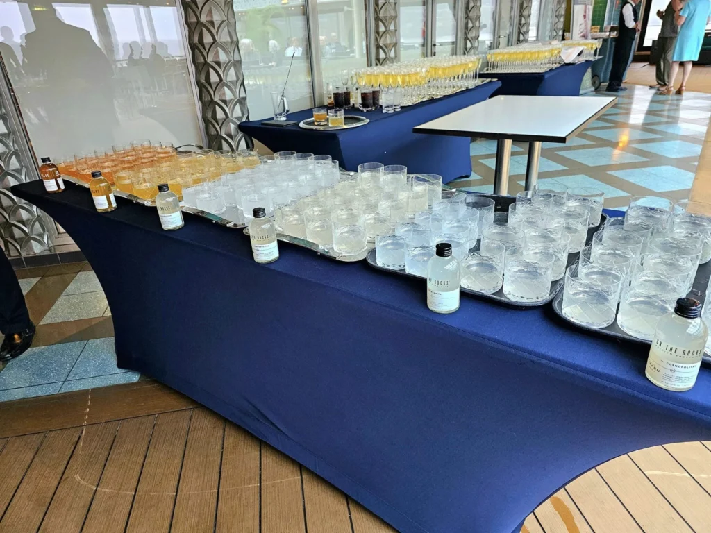 Cruising with Danny and Peter, Holland America Line, Westerdam, Ketchikan, Alaska, United States, Adventure History Thrills | A vibrant collage capturing the Ketchikan Adventure Tour in Alaska, featuring a dynamic log-rolling contest at the Great Alaskan Lumberjack Show with lumberjacks in plaid shirts balancing on a floating log, a rugged UTV navigating a muddy trail through the Tongass National Forest with George Inlet Fjords’ turquoise waters in view, a serene scenic cruise along the Inside Passage with a bald eagle soaring above mist-covered mountains, and a cozy scene at George Inlet Lodge with a rustic table set with craft beers, creamy crab chowder, hot Dungeness crab, and blueberry cheesecake. In the background, Ketchikan’s historic Creek Street showcases colorful buildings on stilts and a Tlingit totem pole, framed by lush greenery and rugged Alaskan peaks, embodying the city’s thrilling adventures and rich cultural heritage.