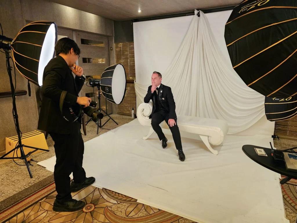 Cruising with Danny and Peter, Holland America Line, Westerdam, Seward, Alaska, United States | A panoramic view of Seward Harbor with rugged cliffs and serene waters, capturing Alaska's wilderness on a photography adventure. Travelers document vibrant wildflowers and snow-capped peaks in Chugach National Forest during an Alaska wilderness cruise. Historical remnants of the 1890 Gold Rush in Seward, including old mining equipment in lush alpine meadows, offer perfect scenes for photography enthusiasts. A majestic bald eagle soars over the tranquil waters of Seward Harbor, while senior-friendly guided tours explore accessible trails amidst stunning natural landscapes.