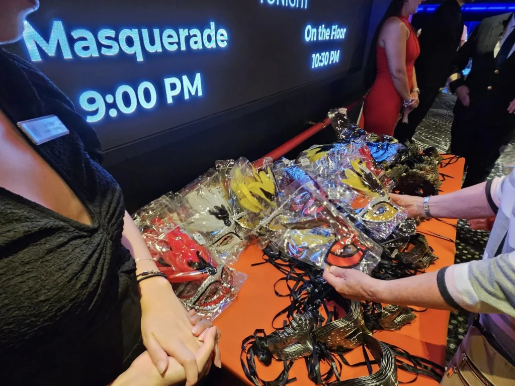 Cruising with Danny and Peter, Holland America Line, Westerdam, Seward, Alaska, United States | A panoramic view of Seward Harbor with rugged cliffs and serene waters, capturing Alaska's wilderness on a photography adventure. Travelers document vibrant wildflowers and snow-capped peaks in Chugach National Forest during an Alaska wilderness cruise. Historical remnants of the 1890 Gold Rush in Seward, including old mining equipment in lush alpine meadows, offer perfect scenes for photography enthusiasts. A majestic bald eagle soars over the tranquil waters of Seward Harbor, while senior-friendly guided tours explore accessible trails amidst stunning natural landscapes.