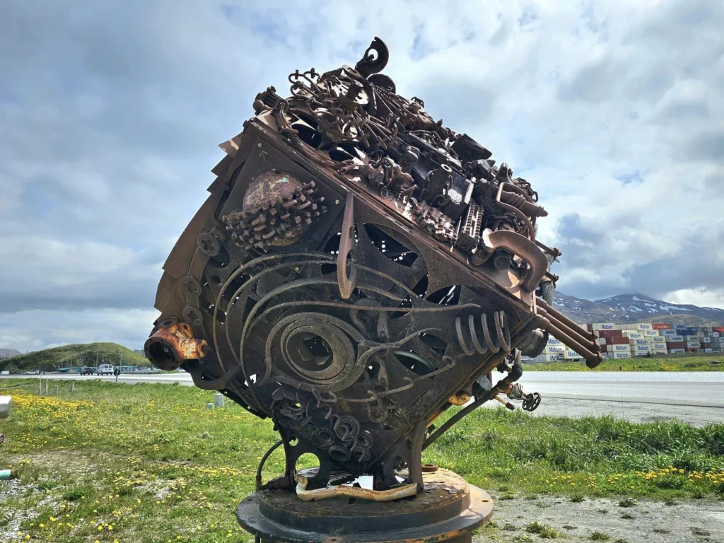 Cruising with Danny and Peter, Holland America Line, Westerdam, Dutch Harbor, Unlaska, Alaska, United States | Scenic view of Dutch Harbor Unalaska featuring rugged mountains and the Bering Sea, with a hiker on Mount Ballyhoo Trail, a majestic bald eagle soaring above, and the historic Russian Orthodox Church with its distinctive onion domes. Includes a fresh seafood dish representing local cuisine and a birdwatching spot at Unalaska Island Bird Sanctuary, capturing the charm of Unalaska's blend of natural beauty, wildlife, and cultural heritage.