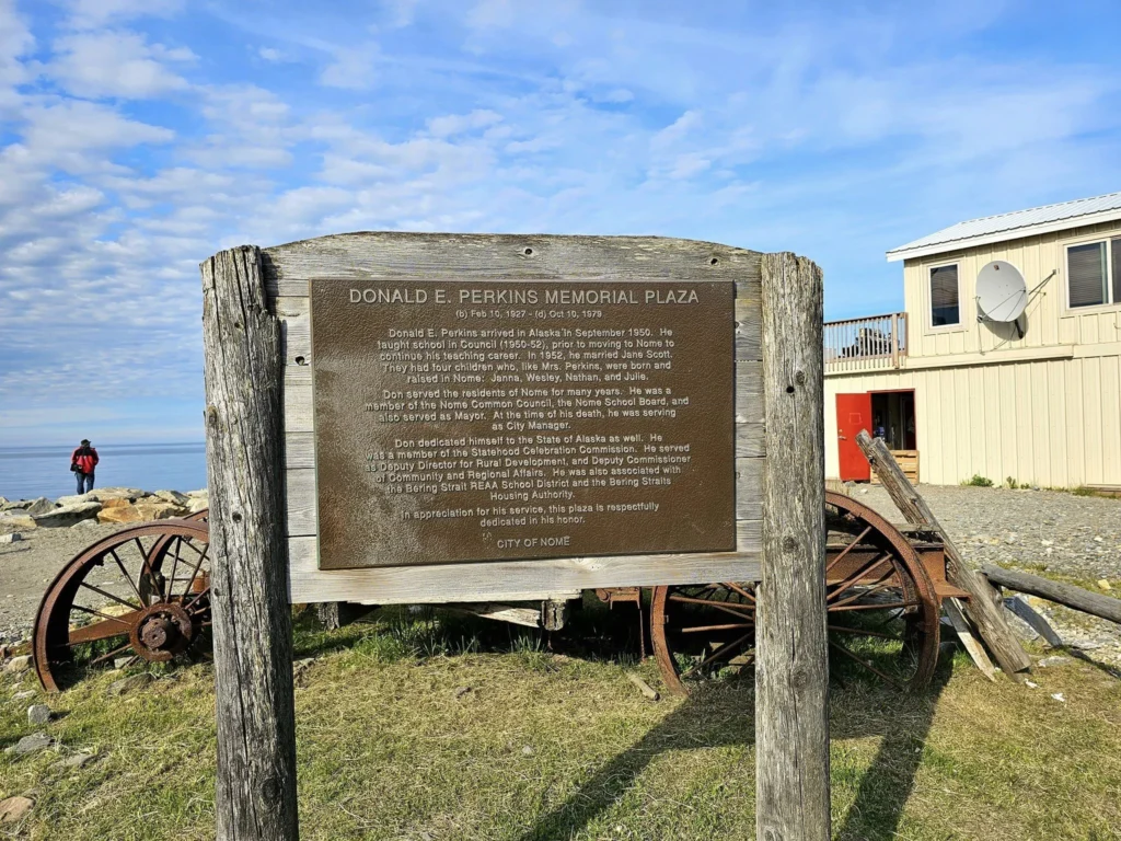 Discovering Newton Peak Hike in Nome, Alaska: A Comprehensive Adventure Guide 19 Cruising with Danny and Peter, Holland America Line, Westerdam, Nome, Alaska, United States | Scenic images of the Newton Peak Hike in Nome, Alaska, including the trailhead marking the start of the adventure, hikers ascending the challenging terrain, panoramic summit views of rolling hills and the Bering Sea, wildlife like curious squirrels and soaring birds along the trail, and vibrant wildflowers adding color to the rugged landscape.