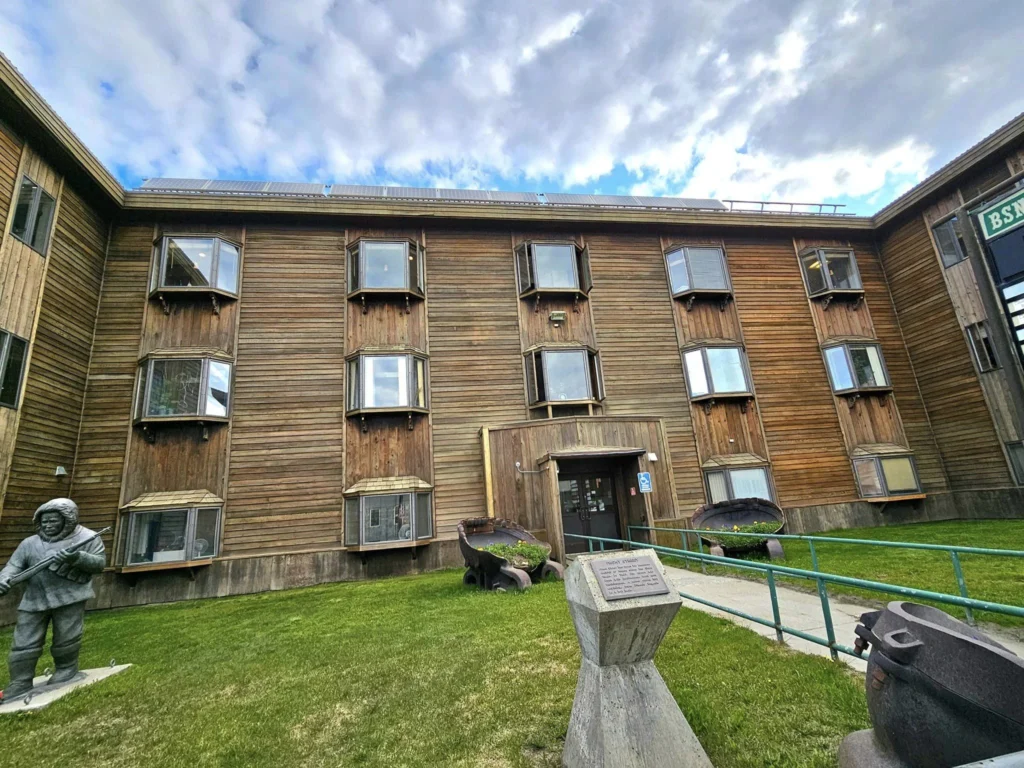 Discovering Newton Peak Hike in Nome, Alaska: A Comprehensive Adventure Guide 22 Cruising with Danny and Peter, Holland America Line, Westerdam, Nome, Alaska, United States | Scenic images of the Newton Peak Hike in Nome, Alaska, including the trailhead marking the start of the adventure, hikers ascending the challenging terrain, panoramic summit views of rolling hills and the Bering Sea, wildlife like curious squirrels and soaring birds along the trail, and vibrant wildflowers adding color to the rugged landscape.