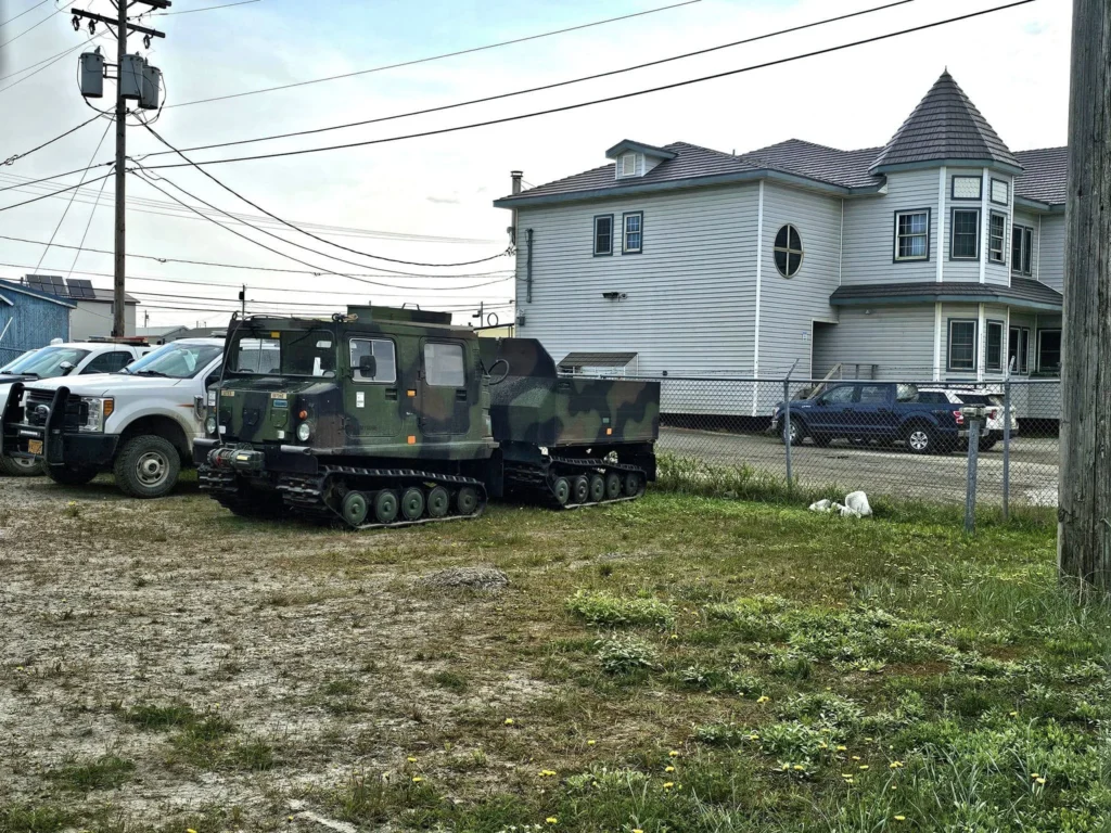 Discovering Newton Peak Hike in Nome, Alaska: A Comprehensive Adventure Guide 24 Cruising with Danny and Peter, Holland America Line, Westerdam, Nome, Alaska, United States | Scenic images of the Newton Peak Hike in Nome, Alaska, including the trailhead marking the start of the adventure, hikers ascending the challenging terrain, panoramic summit views of rolling hills and the Bering Sea, wildlife like curious squirrels and soaring birds along the trail, and vibrant wildflowers adding color to the rugged landscape.