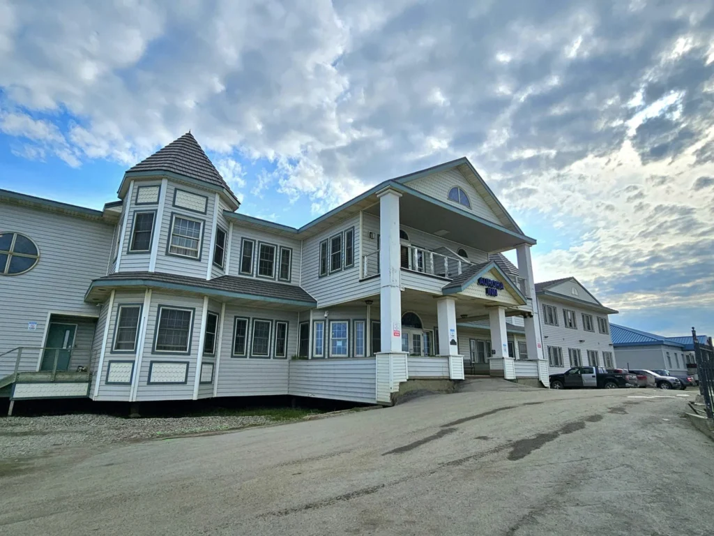 Discovering Newton Peak Hike in Nome, Alaska: A Comprehensive Adventure Guide 25 Cruising with Danny and Peter, Holland America Line, Westerdam, Nome, Alaska, United States | Scenic images of the Newton Peak Hike in Nome, Alaska, including the trailhead marking the start of the adventure, hikers ascending the challenging terrain, panoramic summit views of rolling hills and the Bering Sea, wildlife like curious squirrels and soaring birds along the trail, and vibrant wildflowers adding color to the rugged landscape.