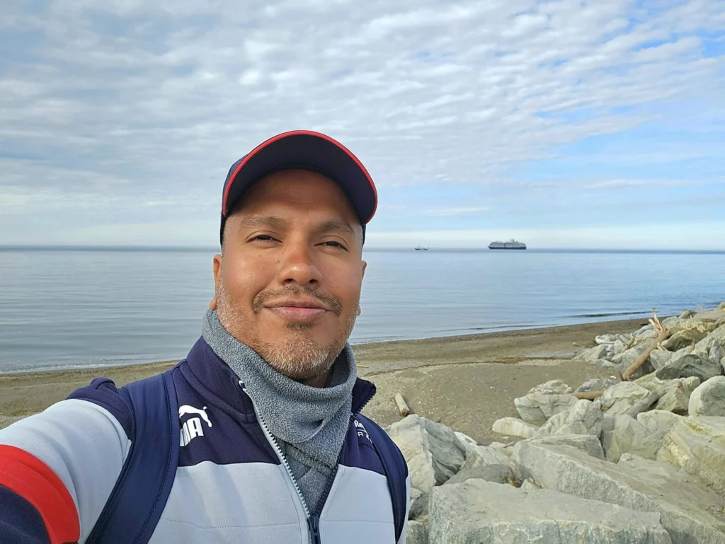 Discovering Newton Peak Hike in Nome, Alaska: A Comprehensive Adventure Guide 28 Cruising with Danny and Peter, Holland America Line, Westerdam, Nome, Alaska, United States | Scenic images of the Newton Peak Hike in Nome, Alaska, including the trailhead marking the start of the adventure, hikers ascending the challenging terrain, panoramic summit views of rolling hills and the Bering Sea, wildlife like curious squirrels and soaring birds along the trail, and vibrant wildflowers adding color to the rugged landscape.