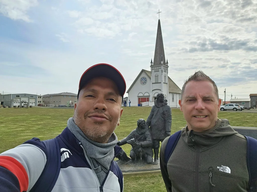 Discovering Newton Peak Hike in Nome, Alaska: A Comprehensive Adventure Guide 38 Cruising with Danny and Peter, Holland America Line, Westerdam, Nome, Alaska, United States | Scenic images of the Newton Peak Hike in Nome, Alaska, including the trailhead marking the start of the adventure, hikers ascending the challenging terrain, panoramic summit views of rolling hills and the Bering Sea, wildlife like curious squirrels and soaring birds along the trail, and vibrant wildflowers adding color to the rugged landscape.